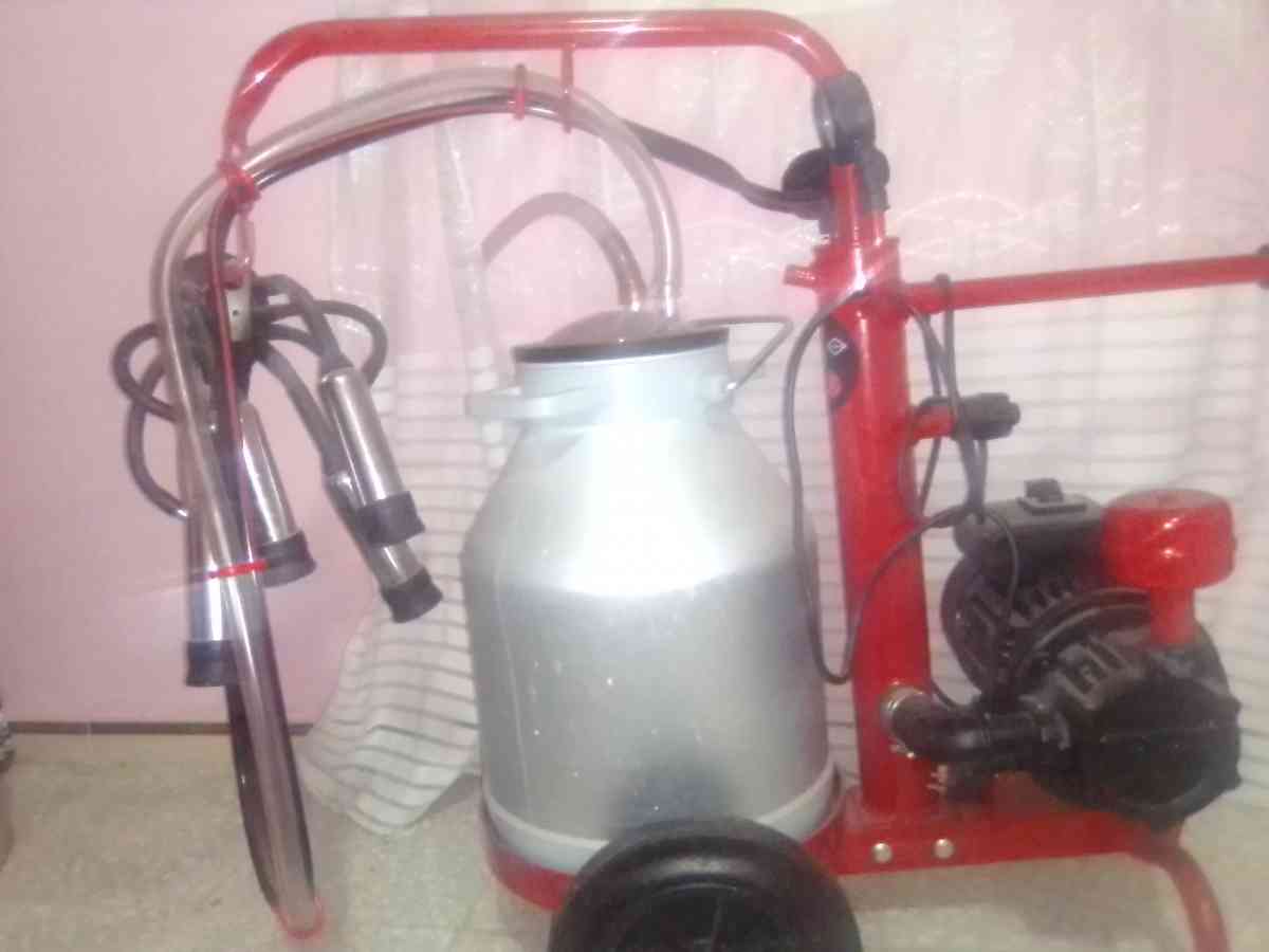 آلة لحلب البقر